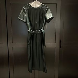 Beautiful green faux leather dress by Shoshanna. Never worn. Tags on.